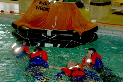sea survival liferaft working together in the liferaft